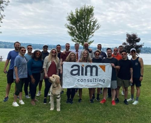 AIM Team Holding Banner